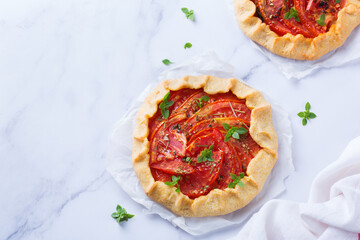 Homemade seasonal savoury summer tomato galette, tart, pie