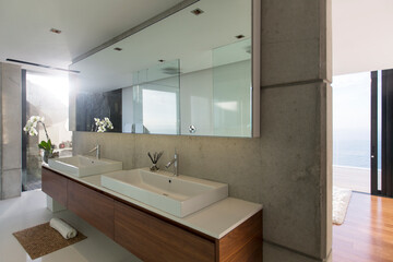 Fototapeta na wymiar Sinks and mirrors in modern bathroom