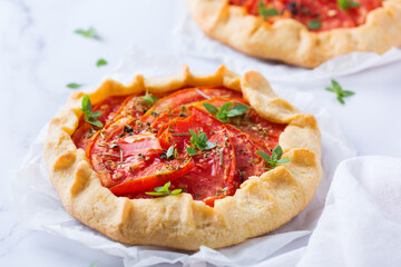 Homemade seasonal savoury summer tomato galette, tart, pie