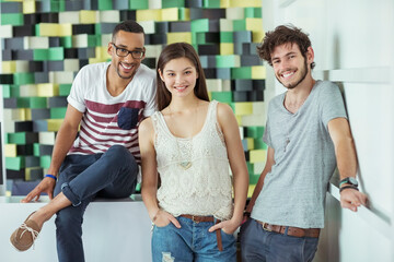 People smiling together in office