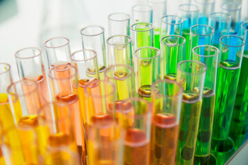 Close up of rack of test tubes with solution in lab