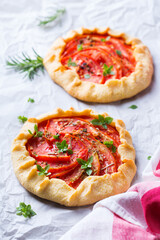 Homemade seasonal savoury summer tomato galette, tart, pie