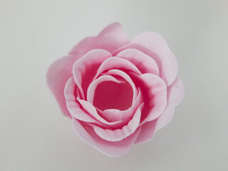 Pieces of soap molded to look like rose petals forming a rose