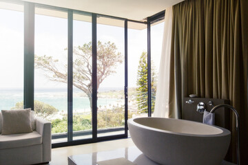 Luxurious bathroom with beautiful view on coast