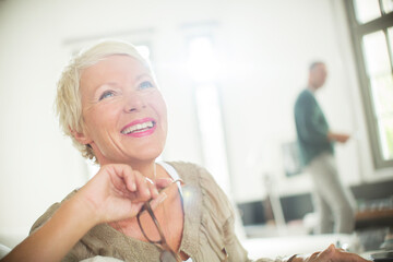 Fototapeta na wymiar Older woman smiling indoors