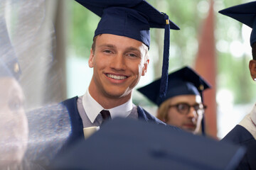Portrait of smiling student during graduation ceremony