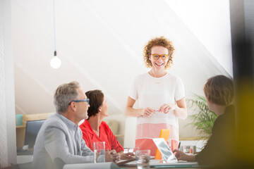 Four people at meeting in office
