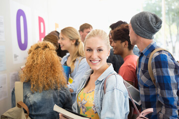 Smiling female student looking at camera
