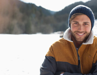 Fototapeta na wymiar Portrait of smiling man in snow