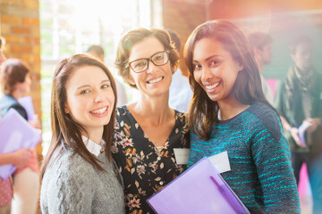 Portrait of smiling women in community center