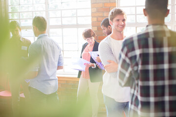 People networking at community center