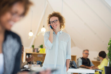 Portrait of woman talking on phone