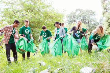 Environmentalist volunteers picking up trash