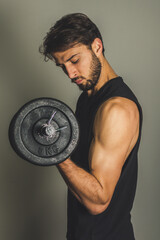 muscular man lifting weights