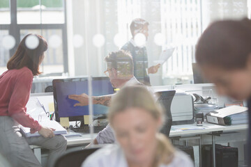 Business people working at computer in office