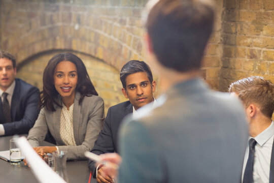 Businesswoman Leading Meeting In Conference Room