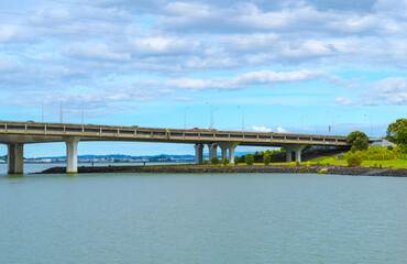 Landscape View to Mangere bridge over the Manukau Harbour, Motorway Bridge in South-Western Auckland New Zealand