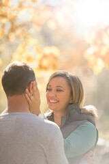 Fototapeta premium Affectionate couple hugging face to face
