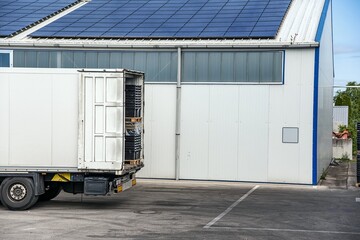 Unloading cargo from the truck  .