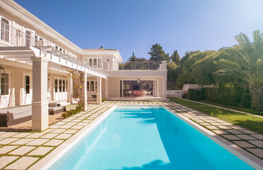 Lap swimming pool along luxury house