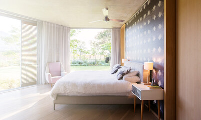 Luxury bedroom open to yard