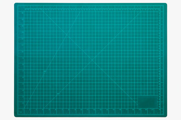 Green DIY cutting mat top view on a white background