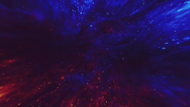 Dust particles. Heaven hell. Blue red contrasting defocused sparks motion.
