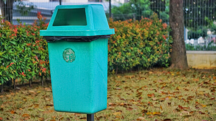 Hanging plastic waste bin in a residential area in Malaysia  