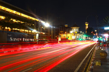 Fototapeta na wymiar Jalan Asia Afrika in Bandung City, Indonesia at night with light trails.