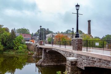 Victoria Street Pedestrian Bridge being rebuilt in 2019, seen in a rainy fall day