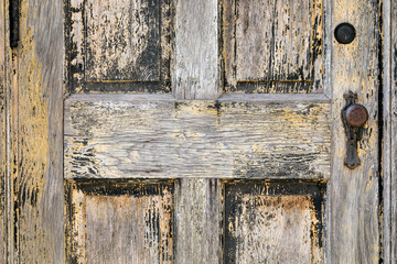 Old and Weathered Wood Door with Knob
