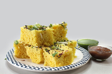 Khaman Dhokla is very popular  Steam cooked Gujarati snacks made from Bengal gram[Chana Dal] and served with chutney.