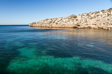Limestone cliffs and clear waters of Point Sinclair, South Australia