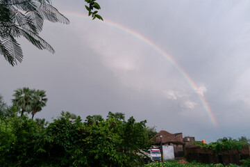 Picture of a rainy day where the rainbow has spread its beauty i