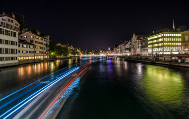 Fototapeta na wymiar Night in Zurich, long exposure of a boat