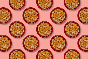 Bowl full of raw popcorn, seen from above