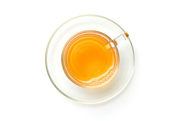 Flat lay (top view) Glass cup of hot tea with saucer isolated on white background. Clipping path.