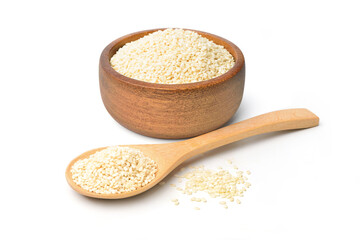 White sesame seeds in wooden bowl and wooden spoon isolated on white background.
