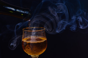 smoke and a cup with a drink