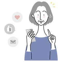 スマホでSNSを楽しむシニア女性