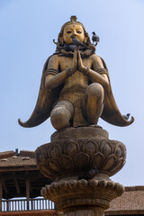 The Garuda Statue in the hand gesture of Namaste for greeting, in Patan Durbar Square, Patan, Nepal
