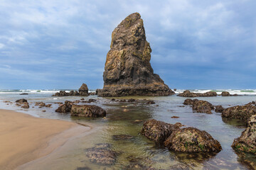 The Needles rock during low tide at Cannon Beach