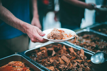 Concept of feeding : Sharing food with people in poor communities