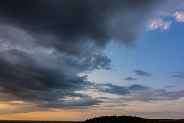 Fototapeta na wymiar Amazing Sunset And Dark Clouds.