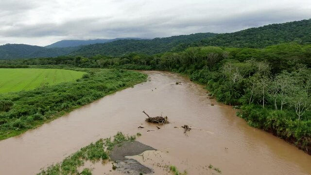 Beautiful cinematic aerial view of the Tarcoles river and its crocodiles in Costa Rica
