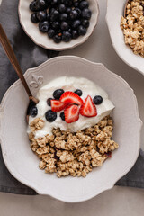 Healthy breakfast concept. Granola with yogurt and berrires.