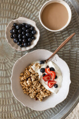 Healthy breakfast concept. Topview image of granola and coffee.