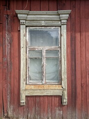 Obraz na płótnie Canvas Old window frame in old wooden house 