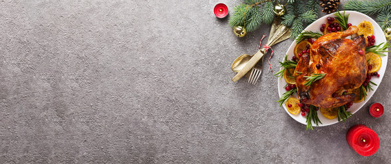 Christmas table with baked turkey or chicken, copy space for text. Christmas dinner, top view
