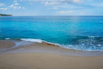Bali island landscape. Seascape with waves, azure water at beautiful hidden white sand. Bali sea beach nature, outdoor Indonesia. Bali island landscape. Summer holidays. Travel, vacation concept.